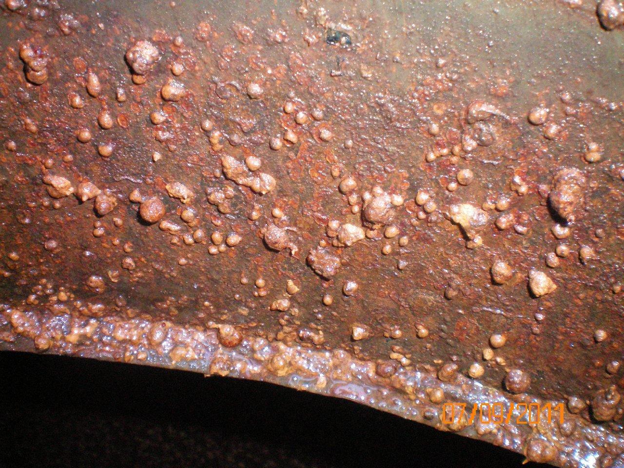 Corrosion craters.
